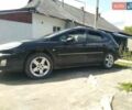 Черный Пежо 407, объемом двигателя 2 л и пробегом 320 тыс. км за 4200 $, фото 1 на Automoto.ua