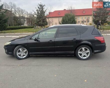Черный Пежо 407, объемом двигателя 2.18 л и пробегом 306 тыс. км за 4800 $, фото 6 на Automoto.ua