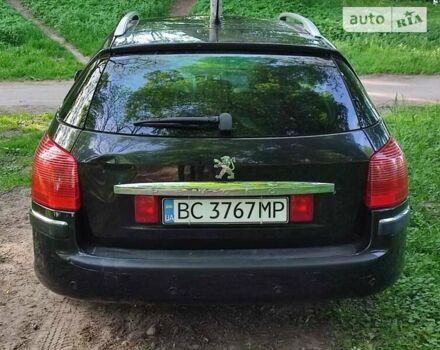 Чорний Пежо 407, об'ємом двигуна 2 л та пробігом 260 тис. км за 4299 $, фото 3 на Automoto.ua