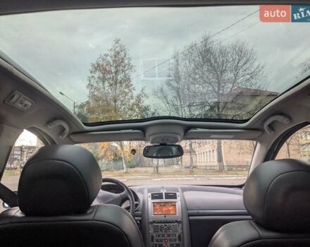 Черный Пежо 407, объемом двигателя 2.18 л и пробегом 306 тыс. км за 4800 $, фото 9 на Automoto.ua