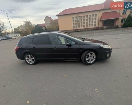 Черный Пежо 407, объемом двигателя 2.18 л и пробегом 306 тыс. км за 4800 $, фото 1 на Automoto.ua