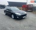 Черный Пежо 407, объемом двигателя 1.56 л и пробегом 270 тыс. км за 2499 $, фото 1 на Automoto.ua
