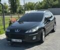 Черный Пежо 407, объемом двигателя 2 л и пробегом 331 тыс. км за 5300 $, фото 1 на Automoto.ua