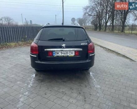 Черный Пежо 407, объемом двигателя 1.56 л и пробегом 270 тыс. км за 2499 $, фото 4 на Automoto.ua