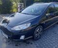 Черный Пежо 407, объемом двигателя 1.6 л и пробегом 333 тыс. км за 3548 $, фото 1 на Automoto.ua