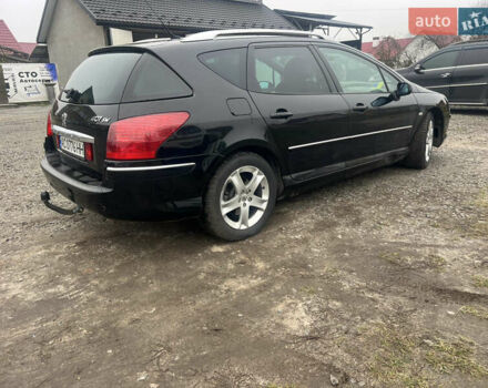 Черный Пежо 407, объемом двигателя 2.18 л и пробегом 265 тыс. км за 5200 $, фото 1 на Automoto.ua