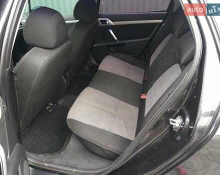 Чорний Пежо 407, об'ємом двигуна 1.8 л та пробігом 240 тис. км за 4700 $, фото 10 на Automoto.ua