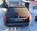 Черный Пежо 407, объемом двигателя 1.56 л и пробегом 250 тыс. км за 2250 $, фото 1 на Automoto.ua