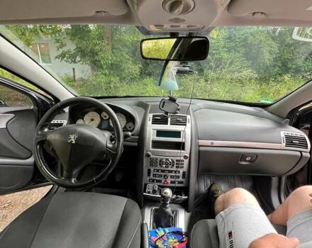 Чорний Пежо 407, об'ємом двигуна 2 л та пробігом 242 тис. км за 5800 $, фото 5 на Automoto.ua