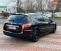 Черный Пежо 407, объемом двигателя 2 л и пробегом 308 тыс. км за 4800 $, фото 6 на Automoto.ua