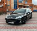 Черный Пежо 407, объемом двигателя 2 л и пробегом 309 тыс. км за 4800 $, фото 1 на Automoto.ua