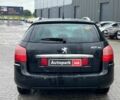 Черный Пежо 407, объемом двигателя 2 л и пробегом 309 тыс. км за 5590 $, фото 1 на Automoto.ua