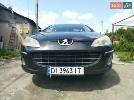 Черный Пежо 407, объемом двигателя 2 л и пробегом 326 тыс. км за 4200 $, фото 1 на Automoto.ua