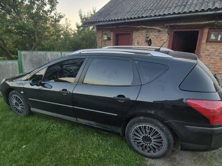 Черный Пежо 407, объемом двигателя 2 л и пробегом 254 тыс. км за 4500 $, фото 1 на Automoto.ua