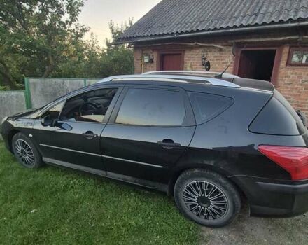 Черный Пежо 407, объемом двигателя 2 л и пробегом 254 тыс. км за 4500 $, фото 1 на Automoto.ua