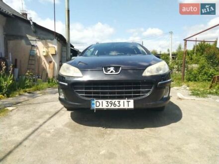 Черный Пежо 407, объемом двигателя 2 л и пробегом 320 тыс. км за 4200 $, фото 1 на Automoto.ua