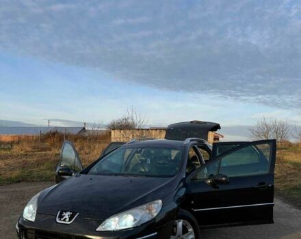 Черный Пежо 407, объемом двигателя 2 л и пробегом 306 тыс. км за 5000 $, фото 1 на Automoto.ua