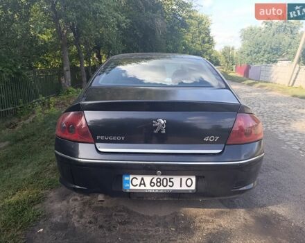 Черный Пежо 407, объемом двигателя 2 л и пробегом 350 тыс. км за 2750 $, фото 1 на Automoto.ua