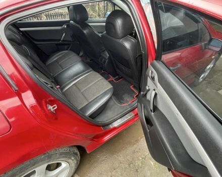 Пежо 407 2005 в Гайсине на Automoto.ua Красный Пежо 407, объемом двигателя 1.7 л и пробегом 246 тыс. км за 3000 $, фото 5 на Automoto.ua