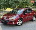 Красный Пежо 407, объемом двигателя 2 л и пробегом 208 тыс. км за 4900 $, фото 1 на Automoto.ua