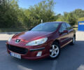 Красный Пежо 407, объемом двигателя 2 л и пробегом 220 тыс. км за 4500 $, фото 1 на Automoto.ua