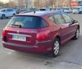 Красный Пежо 407, объемом двигателя 1.8 л и пробегом 306 тыс. км за 3999 $, фото 5 на Automoto.ua