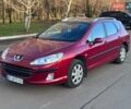 Красный Пежо 407, объемом двигателя 1.8 л и пробегом 306 тыс. км за 3999 $, фото 1 на Automoto.ua