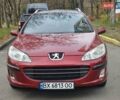 Красный Пежо 407, объемом двигателя 1.75 л и пробегом 305 тыс. км за 3450 $, фото 6 на Automoto.ua