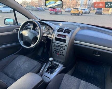 Красный Пежо 407, объемом двигателя 1.8 л и пробегом 306 тыс. км за 3999 $, фото 9 на Automoto.ua