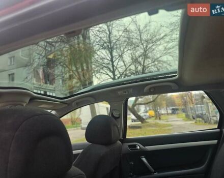Красный Пежо 407, объемом двигателя 1.75 л и пробегом 305 тыс. км за 3450 $, фото 15 на Automoto.ua