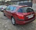 Красный Пежо 407, объемом двигателя 1.75 л и пробегом 303 тыс. км за 4500 $, фото 3 на Automoto.ua