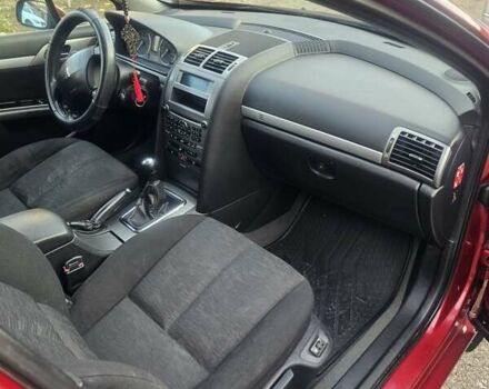 Красный Пежо 407, объемом двигателя 1.75 л и пробегом 303 тыс. км за 4500 $, фото 21 на Automoto.ua