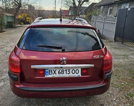 Красный Пежо 407, объемом двигателя 1.75 л и пробегом 303 тыс. км за 4500 $, фото 4 на Automoto.ua