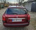 Красный Пежо 407, объемом двигателя 1.75 л и пробегом 303 тыс. км за 4500 $, фото 4 на Automoto.ua