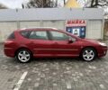Червоний Пежо 407, об'ємом двигуна 2 л та пробігом 250 тис. км за 2899 $, фото 6 на Automoto.ua