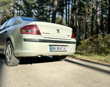Сірий Пежо 407, об'ємом двигуна 1.75 л та пробігом 300 тис. км за 3750 $, фото 3 на Automoto.ua