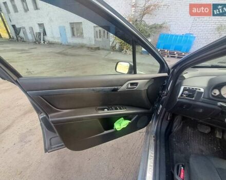 Серый Пежо 407, объемом двигателя 2.01 л и пробегом 370 тыс. км за 5550 $, фото 10 на Automoto.ua