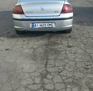 Серый Пежо 407, объемом двигателя 2.23 л и пробегом 321 тыс. км за 4000 $, фото 25 на Automoto.ua