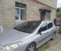 Серый Пежо 407, объемом двигателя 1.56 л и пробегом 175 тыс. км за 3500 $, фото 1 на Automoto.ua