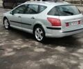 Серый Пежо 407, объемом двигателя 2 л и пробегом 322 тыс. км за 4200 $, фото 1 на Automoto.ua
