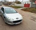 Серый Пежо 407, объемом двигателя 2 л и пробегом 251 тыс. км за 4200 $, фото 1 на Automoto.ua