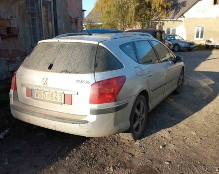 Серый Пежо 407, объемом двигателя 2 л и пробегом 270 тыс. км за 1600 $, фото 4 на Automoto.ua