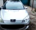 Серый Пежо 407, объемом двигателя 2 л и пробегом 230 тыс. км за 4500 $, фото 1 на Automoto.ua