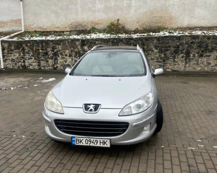 Серый Пежо 407, объемом двигателя 2 л и пробегом 301 тыс. км за 4700 $, фото 1 на Automoto.ua