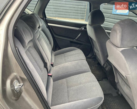 Серый Пежо 407, объемом двигателя 2 л и пробегом 305 тыс. км за 3800 $, фото 7 на Automoto.ua