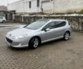 Серый Пежо 407, объемом двигателя 2 л и пробегом 301 тыс. км за 4700 $, фото 1 на Automoto.ua