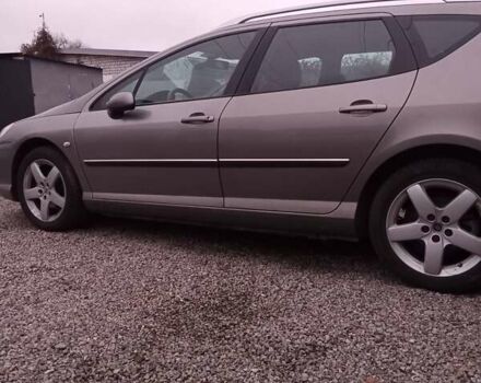 Серый Пежо 407, объемом двигателя 2 л и пробегом 314 тыс. км за 3490 $, фото 1 на Automoto.ua