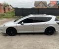 Серый Пежо 407, объемом двигателя 2 л и пробегом 317 тыс. км за 6500 $, фото 1 на Automoto.ua
