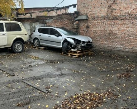 Серый Пежо 407, объемом двигателя 2 л и пробегом 310 тыс. км за 2000 $, фото 1 на Automoto.ua