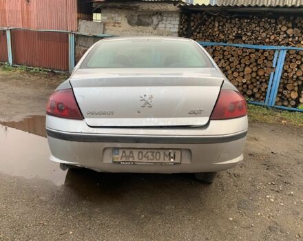 Серый Пежо 407, объемом двигателя 2 л и пробегом 360 тыс. км за 941 $, фото 1 на Automoto.ua